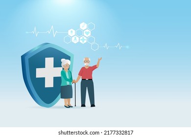 Senior couple with protection from medical insurance shield guard. Medical and healthcare insurance planning for elderly, healthy aging concept.