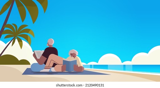 senior couple reading books at beach old man and woman family spending time together relaxation retirement