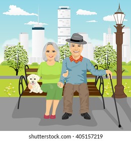 senior couple sitting on wooden bench with dog resting in city park