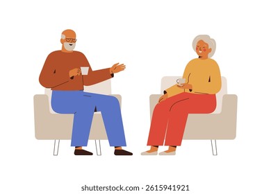 senior couple talking over a cup of tea sitting in armchairs. grandpa and grandma spending time together in conversation at home. communication and support for elderly people.