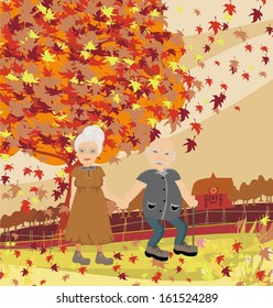 Senior couple walking in autumn day 