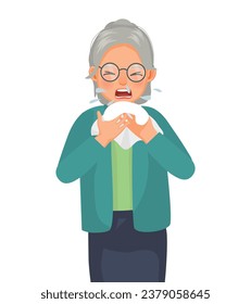 Senior elderly woman with runny nose holding a handkerchief or tissue sneezing and blowing because of fever, cold, flu, allergy, virus infection