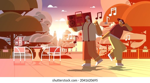 senior family with bass clipping blaster recorder dancing and singing grandparents having fun active old age concept