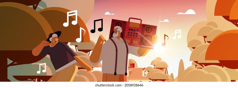 senior family with bass clipping blaster recorder dancing and singing grandparents having fun active old age concept