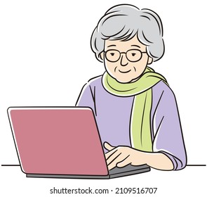 Mujer mayor que opera un ordenador personal