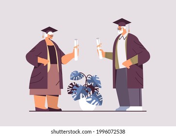 senior graduated students aged man woman graduates celebrating academic diploma degree education