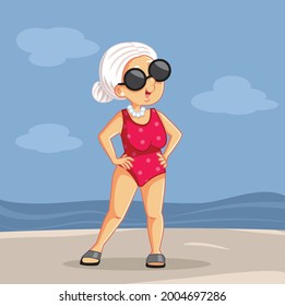 Senior Lady Enjoying Summer Vacation at the Beach. Old tourist woman enjoying retirement vacation traveling to a tropical island feeling confident and body positive
