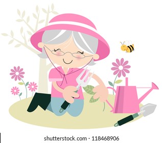 Senior Lady Gardening Grey haired senior woman in the garden suggesting leisure time/retirement/hobby/ relaxing