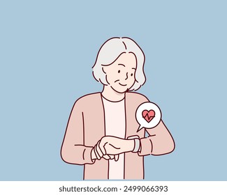 Personaje senior de estilo de vida. Una mujer mayor está comprobando su salud mirando su reloj inteligente. Ilustraciones de diseño de Vector de estilo dibujado a mano.