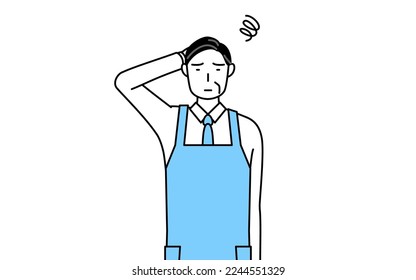 A senior man in an apron scratching his head in distress.