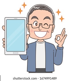 A senior man in blue-grey clothes.He uses a smartphone.