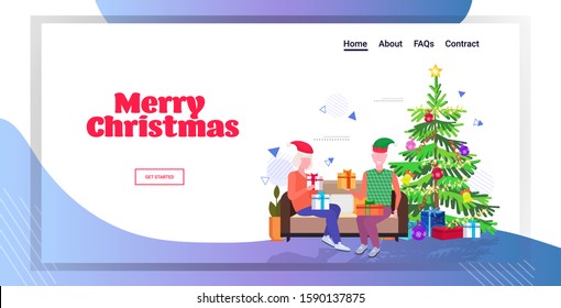 senior man in elf hat giving present gift box to mature woman family sitting on couch celebrating merry christmas happy new year winter holidays concept full length greeting card horizontal vector