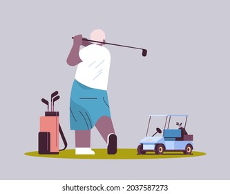 senior man playing golf aged african american player taking a shot active old age concept horizontal full length