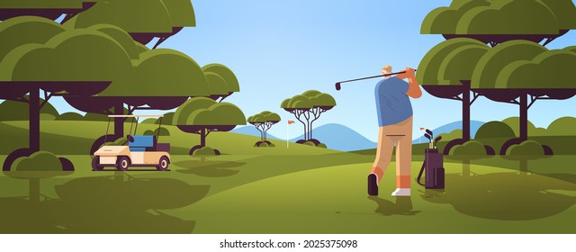 senior man playing golf on sunny green golf course aged player taking a shot active old age concept