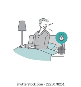 Senior man setting alarm on smart speaker
