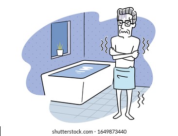 Senior man shivering in cold bathroom