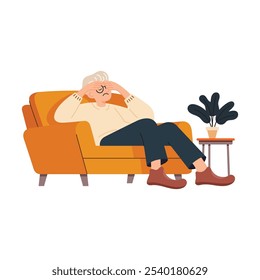 Senior man sitting on an armchair, suffering from a headache or stress.