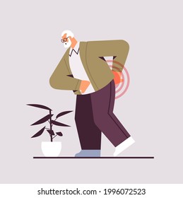senior man suffering from back pain old age problems concept painful inflamed area highlighted in red color
