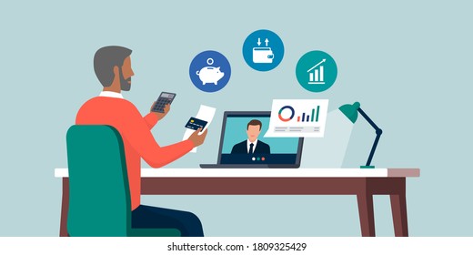 Senior man videocalling his financial consultant online and receiving financial advices