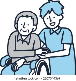 Senior man in wheelchair and male caregiver