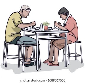 Senior man and woman while eating in a restaurant.