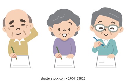 Senior Men And Women Writing Paperwork