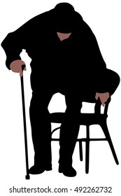 Senior or old man sitting down on old wooden chair with his cane 
