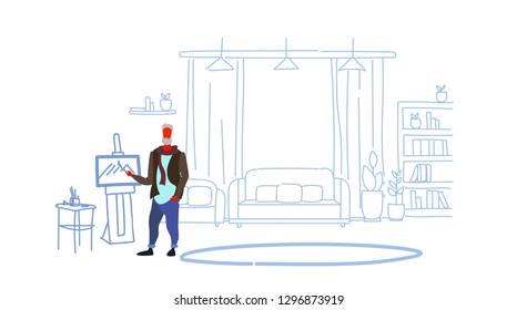senior painter holding paintbrush man artist painting process art workshop studio interior sketch doodle full length horizontal