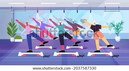 senior people group doing squats on step platform aged men women training in gym aerobic workout healthy lifestyle