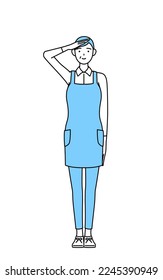 A senior woman in an apron making a salute.