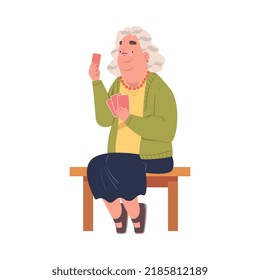 Senior Woman Character Playing Cards Game Sitting on Chair Vector Illustration