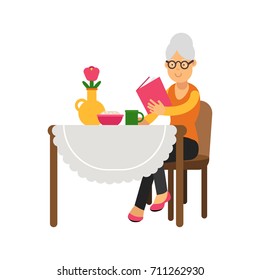 Senior woman character sitting near the table, drinking tea and reading a book colorful vector Illustration