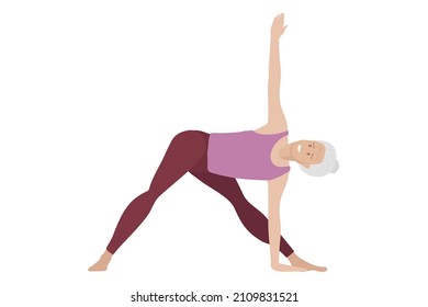 Senior woman doing yoga. Woman in sportswear makes Triangle Pose. Elderly Lady happy and enjoys old age. Women healthy life style concept. Healthy lifestyle for pensioners