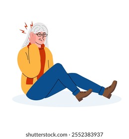 Senior woman experiencing ear discomfort while sitting on the floor in a cozy environment