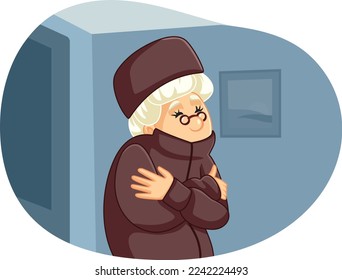 
Senior Woman Freezing Feeling Cold at Home Vector Illustration. Unhappy grandma shivering in her own house due to energy crisis and poverty
