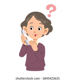 Senior woman having doubts about answering the phone