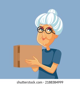 
Senior Woman Holding a Cardboard Box Vector Cartoon Illustration. Happy granny receiving a mail package as a gift 
