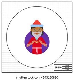 Senior woman holding Christmas ornament