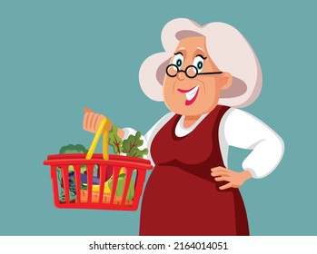 
Senior Woman Holding a Shopping Basket with Groceries Vector Cartoon. Elderly shopper buying healthy food from the supermarket
