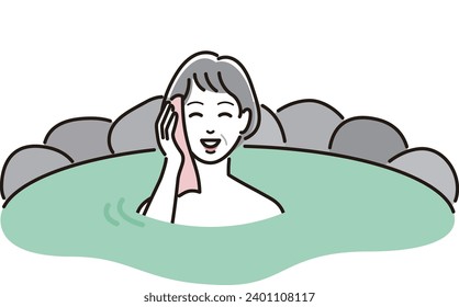 Senior woman relaxing in an open-air bath
