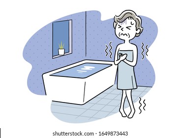 Senior woman shivering in cold bathroom