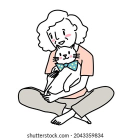 Senior woman sitting with adorable cat on her lap. Happy mature woman sitting on the floor with her cat. Smiling elderly woman playing with white cat at home. White cat sitting happily on owner's lap.