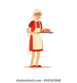Senior woman standing and holding a tray with fresh baked pie colorful character vector Illustration