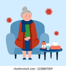 Senior woman suffering from flu with scarf and blanket. Old female has fever and take thermometer in mouth. Cold or influenza disease concept. Season allergy.