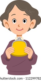 
A senior woman with a wallet