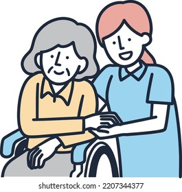 Senior woman in wheelchair and caregiver