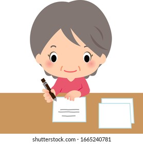 Senior woman writing on a paper