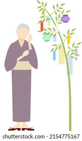 Senior Woman in yukata, Looking at a Tanabata bamboo branch, image of Tanabata