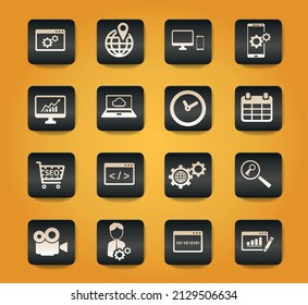 SEO and development symbols on black buttons on yellow background