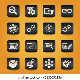 seo and development symbols on black buttons on yellow background
